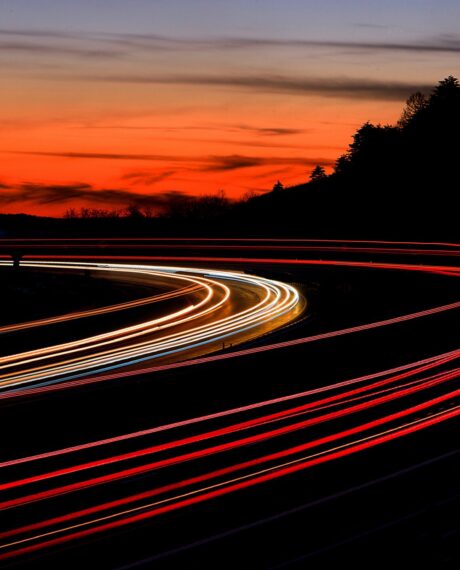 tail light streaks on highway at night. Long exposure.