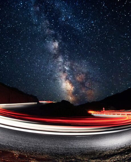 Stars and cars lights trails in the road